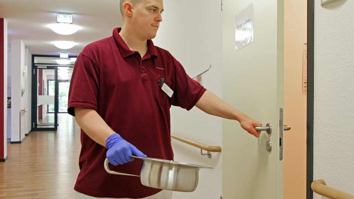 Nurse enters utility room Nurse enters utility room